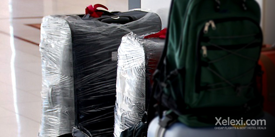 travel-wrapped-suitcase-xelexicom